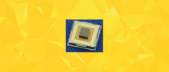 A small circuit board on a yellow banner background